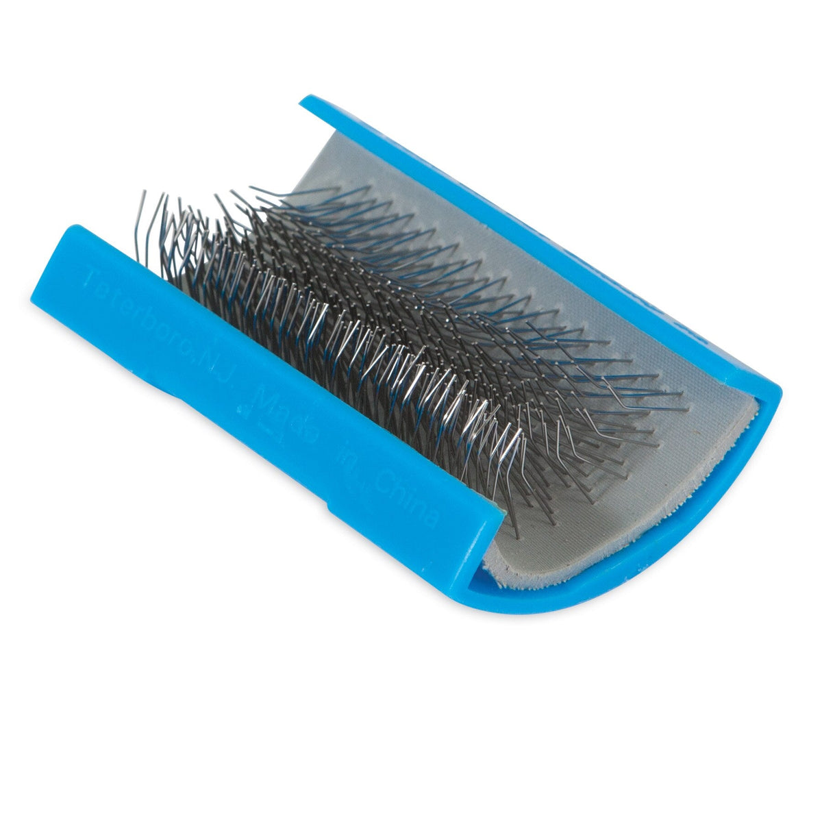 The JW Pet JW Bird Perch Cleaner features a blue plastic holder with densely packed, bent metal pins in rows, designed as a replacement brush strip or perch cleaner for pet grooming and cleaning tools.